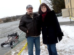 FRANKFORD, QUINTE WEST, ON, (02/07/2013) Frankford, ON., residents Dan and Liane Wood are shown here Feb. 7, 2013, near a vehicle submerged in the Trent River. The couple are being hailed as local heroes after saving a 13-year-old girl from the vehicle after it crashed through a fence, flipped over and dove into the freezing cold water around 8:30 p.m. on Feb. 6, 2013. Dan is the pastor at Full Gospel Tabernacle. The pair were finishing up with a church event when the incident occurred. 
EMILY MOUNTNEY/TRENTONIAN/QMI AGENCY