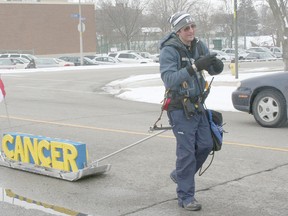 Mike Duhacek passed through Chatham on Feb. 5 as part of his Windsor to Ottawa walk to bury cancer.