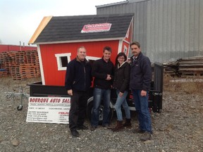 The 2012 Korn for Kids campaign held a draw for a funny playhouse and Christine Duclos of Schumacher was the winner. Rey Brisson from Korn for Kids, Mark Villeneuve of Villeuve Construction and Randy Richards from Richards Moving in Timmins helped deliver the house in November 2012.