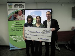 Leduc County mayor John Whaley stopped by a planning session for the upcoming Alberta Special Olympics Summer Games on Saturday, Feb. 2, and brought with him a $5,000 dollar cheque to go towards the planning of the event. Organizing committee chair Michelle Deering (centre) and Devon mayor Anita Fisher accepted the cheque.