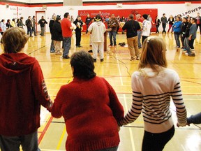 Native and non-native students at Northern Secondary School in Sturgeon Falls joined hands in friendship during a round dance, Thursday. Nathalie Restoule coordinated an hour-long assembly with guest speaker Rodney Commanda, a Nipissing First Nation Idle No More organizer.