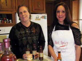 Derek Stewardson and business partner Lorelei Enns have launched a new website to sell hot and spicy foods and sauces. SpicyIsGood.com is quickly building a following, they say. CATHY DOBSON/ THE OBSERVER/ QMI AGENCY