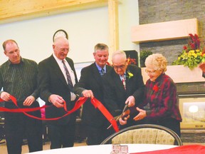 The common room of the Hanna Seniors Lodge was filled with people celebrating its grand opening on Thursday January 31 with dinner, music from the Over the Hill Gang and speeches from guests who espoused community involvement. Kudos were given to the Special Areas for their co-operative effort in building three new lodges in the area, volunteers like the Sunshine and Lions Clubs who helped raise funds and the staff and residents who make the lodge home. A number of officials were on hand to celebrate the day, like Mayor Mark Nikota, Special Areas Chairman Jay Slemp and MLA Rick Strankman, as well as ribbon cutters and Lodge residents Charlie Fielding and Florance Storch.