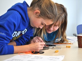 Young scientists, Charlotte Berry (left) and Sarah Babb of Saugeen Shores took part in the camp.