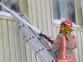 Firefighters battle a blaze at the former Northern Breweries building on Bay Street on Thursday, Feb. 7, 2013.