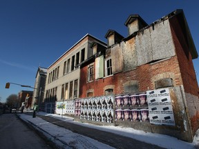 A crumbling building at 287 Cumberland Street in Ottawa, Ont. Tuesday Feb 5, 2013. The city of Ottawa has been ordered to repair the unsafe heritage building. 
Tony Caldwell/Ottawa Sun/QMI Agency