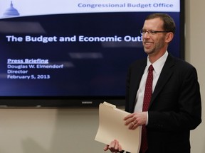 Congressional Budget Office (CBO) Director Douglas Elmendorf arrives at a news conference to release the CBO's annual "Budget and Economic Outlook" report on Capitol Hill in Washington on Feb. 5, 2013. (REUTERS)