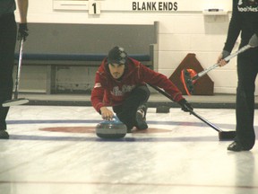 Aaron Sluchinski delivers a stone during a recent Super League game at the Airdrie Curling Club. Sluchinski is skipping a team at this week’s mens’ provincial championships in Leduc.
CHRIS SIMNETT/AIRDRIE ECHO