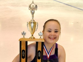 Timmins Porcupine Figure Skating Club member, Julia Romualdi was presented with the prestigious Eva Thompson Award at the 2013 James Bay Interclub Competition at the Archie Dillon Sportsplex.