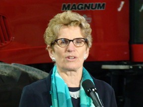 Ontario premier-designate Kathleen Wynne visits a Bradford, Ontario, farm on
Feb. 6, 2013 to visit with agriculture stakeholders. (Antonella Artuso/QMI Agency)