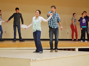 In the foreground, Grade 12 students Tayte Mitchell and Julia Yuan demonstrate some dance steps from the song Do Wah Diddy to performers in the County Central High School Drama Club Feb. 5 during a choreography rehearsal for this year’s play, Leader of the Pack: The Ellie Greenwich Musical, at the Cultural-Recreational Centre. Yuan is the play’s choreographer. Tickets for the show are now on sale and are available at the school or Market Street Foods. They cost $7, but can still be purchased at the door for $10. The show takes place March 14-15.