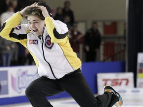 Manitoba skip Matt Dunstone jumps for joy after winning the Canadian junior men's curling title on Sat., Feb. 9, in Fort MucMurray, AB.
Mark O'Neill/Special to QMI