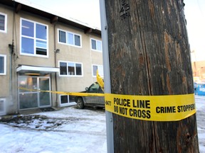 Police investigates the scene of a stabbing on 103 Street and 106 Avenue in Edmonton, Alberta on Feb.10, 2013.  One man was stabbed and taken to hospital with serious injures.  Police are questioning several individual at the scene.  Perry Mah/Edmonton Sun/QMI Agency