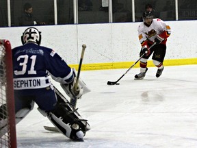 GREG GOLGAN, QMI Agency

Mounties forward Brandan Verasamy drives to net Saturday in the third period of Game 4 of the Niagara District Junior Hockey League West Division quarter-final series with the Navy Vets at the Brant Sports Complex. Paris won the series 4-0.