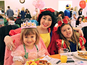 HEATHER CARDLE, for The Expositor

Quinn Edwards (left) and Ava Cocca pose with Snow White during the fifth annual Kids Can Fly Storybook Breakfast on Saturday at Rossini Lodge on Grey Street. More than 400 children attended the fundraiser. Turn to Page A3 for the story and more photos.