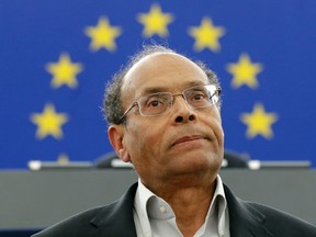 Tunisia's President Moncef Marzouki reacts as he delivers his speech at the European Parliament in Strasbourg, Feb. 6, 2013. REUTERS/Christian Hartmann