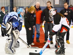 During the opening ceremonies on Friday (Feb.8) at The Plex, in memory of Caitlyn Cobean, goalies were asked to partake in a puck drop as Midget Storm goalie is Caitlyn’s sister, Bryanna Cobean. Dropping the puck was Caitlyn’s mother, Rona, also in support were Caitlyn’s father and brother, Jim and Dylan.