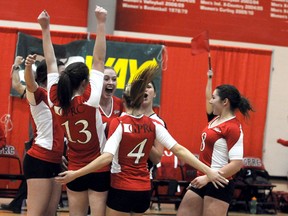 The Wolves celebrate after the upset win. The (national) No. 15 ranked Grande Prairie Regional College Wolves beat the No. 7 ranked Grant MacEwan Griffins 3-1 in ACAC women’s volleyball at GPRC gym Friday. (Terry Farrell/Daily Herald-Tribune)