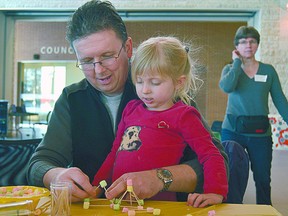 David Wilson and Jenni Wilson, 4, craft marshmallow structures at the Strathcona County Community Centre’s agora at a 2011 Family Day event. File Photo