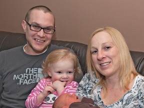 BRIAN THOMPSON, The Expositor

Lucas Faustini, his wife, Nadine Rossi, and two-year-old Malia pose with the latest addition to their family, Blake, who was born at home Friday after a 26-minute labour.