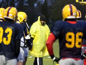 Queen’s Golden Gaels defensive line coach Leroy Blugh, at a practice during the 2011 season, has accepted a job as the defensive line coach with the Edmonton Eskimos, the team with which he spent 11 of his 15 seasons as a player in the Canadian Football League. (Whig-Standard file photo)