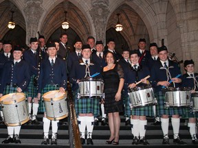 The Paris-Port Dover Pipe Band pose with Speaker Andrew Scheer and Brant MP Phil McColeman when they played the Robbie Burns dinner on Parliament Hill recently. SUBMITTED PHOTO