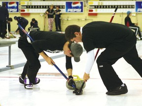 Two boys from Beaver Brae sweep the ice at the Kenora Curling Club as they take on the squad from St Thomas Aquinas. The Broncos’ boys team went undefeated with a 3-0 record.
GRACE PROTOPAPAS/Daily Miner and News