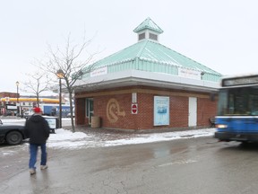 City buses at the Owen Sound Transit bus terminal.