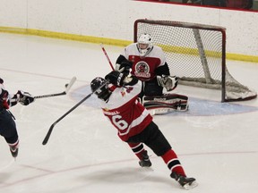 A North Bay Trappers player takes a shot on the Blind River Beavers goaltender.
Photo by DAWN LALONDE/QMI AGENCY