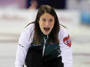 P.E.I. skip Suzanne Birt shouts as she watches her shot against B.C. at the Scotties Tournament of Hearts in Charlottetown in 2011. (Reuters file photo)