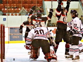 DARRYL G. SMART, The Expositor

Jamie Williams (14) of the Blast celebrates his first-period goal Tuesday night against the Real McCoys during Allan Cup Hockey action at the civic centre.