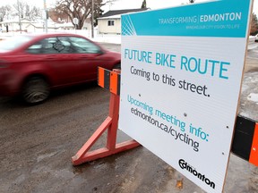 Traffic makes its way along 76 Avenue near 97 Street, in Edmonton, Alta. on Tuesday Feb. 12, 2013. The avenue is slated for a future bike route. David Bloom/Edmonton Sun/ QMI Agency