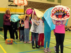 Grade 2 students at Cobblestone Elementary School get ready to perform a Dragon Dance in the gym with help from teacher Stephanie Morgan on Monday, Feb. 11, 2013 in celebration of Chinese New Year. MICHAEL PEELING/The Paris Star/QMI Agency
