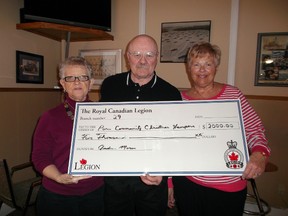 Paris' Royal Canadian Legion Branch 29 president Andy Moran presents a $2,000 cheque to help support the Paris Christmas Hamper program on Thursday, January 31, 2013. Accepting the donation are committee members Marg Knill-Wilson, left, and hamper committee chair Shirley Simons. SUBMITTED PHOTO