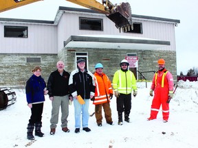 Members of the Allumette Island council and municipality observe the final moments of the former Chez Charles Hotel Tuesday. From left to right is councillors Gene O’Brien, Andre Vaillancourt, Roger Lavoie and municipal employees David Fleury, Laurier Allard and Herbie Fleming. The 52-year-old landmark is being demolished this week after laying vacant for the past two decades.