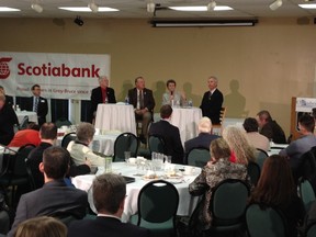 Meaford Mayor Francis Richardson, Georgian Bluffs Mayor Al Barfoot, Owen Sound Mayor Deb Haswell and Chatsworth Mayor Bob Pringle take questions from the floor during a mayor's forum Wednesday at Stone Tree.