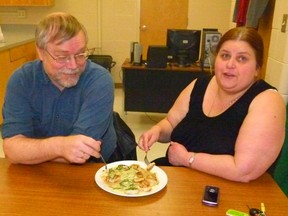 Stan and Diane Golob enjoy scallops in beurre blanc sauce they cooked during the Valentines Day Romantic Dinner cooking class