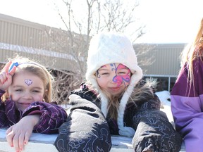 Sophie Yaw, Allison McDonald, Katie Lamothe are all smiles after having their faces painted during the Espanola Winter Carnival this past weekend.  
Photo by Dawn Lalonde/Mid-North Monitor/QMI Agency