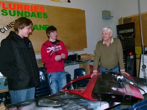 Autobody repair instructor Dale Portsmouth with Hines Creek Composite students Andrew Wayland and Riley Polukoshko.