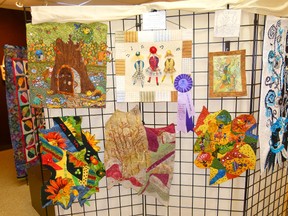 A few of the quilts now on display at the Fairview Fine Arts Centre