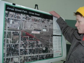 Arthur Voaden Secondary School Grade 9 student Braden Walton takes a look at where a new St. Thomas skate park could fit in Jonas St. Park during a public information session at the Timken Centre Wednesday. (Nick Lypaczewski, Times-Journal)