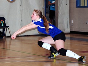 St. Joseph's Bernadette Welch digs up a ball against Monseigneur Bruyere in senior girls volleyball exhibition play Wednesdsay at the Tommy White Athletic Centre. The visitors won 22-25, 25-23, 21-25, 25-9, 15-4. In junior play, Bruyere prevailed 25-19, 25-21, 25-23.  R. MARK BUTTERWICK / St. Thomas Times-Journal / QMI AGENCY