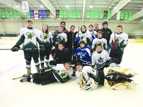 Coaches, manager, and players of the Napanee Peewee Select Team at a practice at the Strathcona Paper Centre.