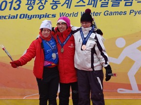 Rachelle Barbeau (left) receives one of he two silver medals