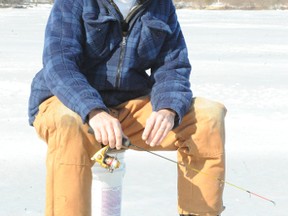 Enjoying an afternoon angling for perch and pike at the Waterford North Conservation Area Wednesday was Phil Meyers of Simcoe. (MONTE SONNENBERG Simcoe Reformer)