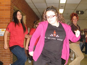 Terra Manuliak, a first-year social services student at the Simcoe campus of Fanshawe College, led her classmates in a dance at the school to mark the annual One Billion Rising event, a worldwide movement to promote awareness about violence against women. (DANIEL R. PEARCE  Simcoe Reformer)