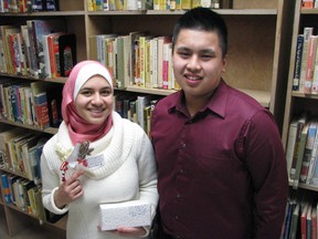 Northern students Yasmeen Ibrahim and Graham Pedregosa show off chocolate being sold to fundraise a trip to Parliament Hill. The Grade 12 students have been selected to participate in the Forum for Young Canadians. BARBARA SIMPSON/ THE OBSERVER/ QMI AGENCY