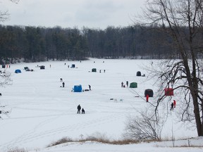 An ice fishing derby held at Pinehurst Lake north of Paris in 2010. COURTESY OF GRCA