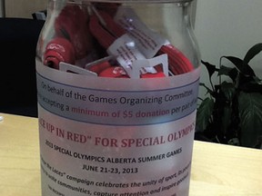 Donation jars like the above will, as of this weekend, be available at several local businesses as well as the town office. For a minimum donation of $5, donors can help support the staging of the Alberta Special Olympics Summer Games, to be held in Devon this June.