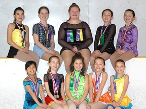 The Tisdale Skating Club skaters pose with their hardware from the 2013 James Bay Competition recently held in Timmins. Front row, from left Miah Yuan Corbeil, Savannah Belec-Gelinas, Lauren Deacon, Madison McKinnon and Abbygale McKinnon. Back row Grace Manol, Dana Price, Bronte Cadeau, Shelby Deacon and Tiana Andrews.